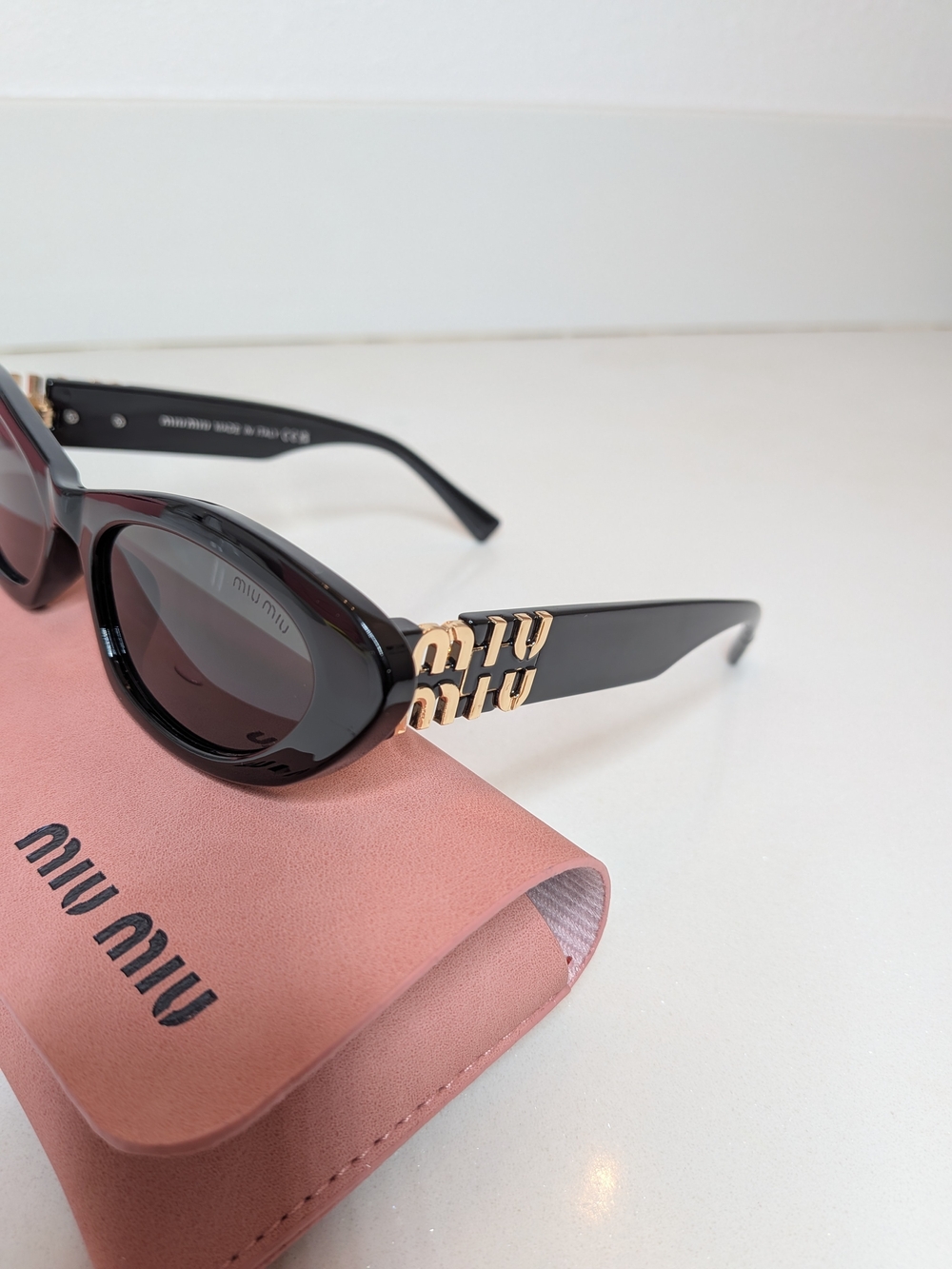 Miu Miu Women's Black Oval Cat Eye Sunglasses - Picture 10 of 13
